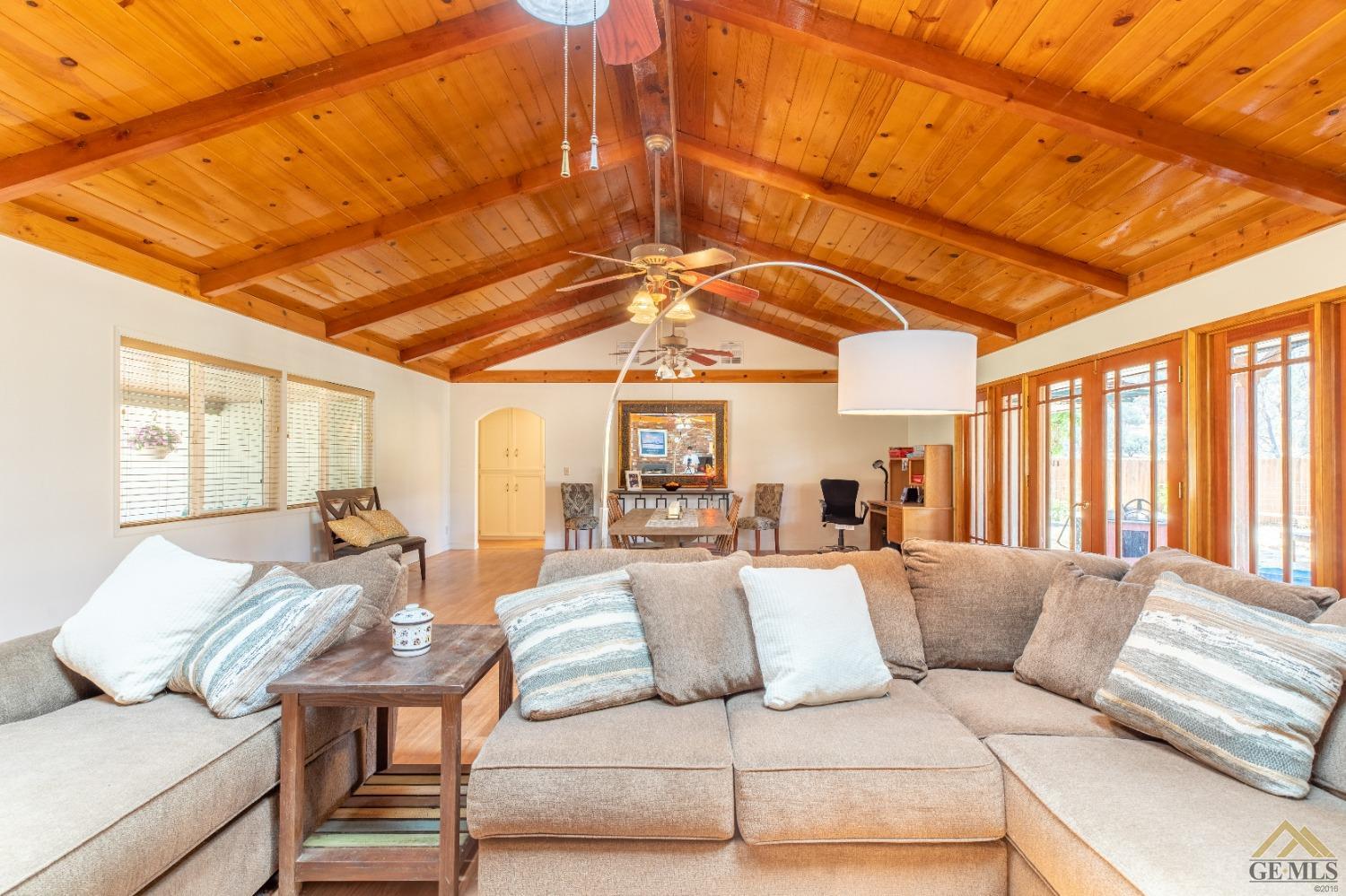 Undisclosed Address Caliente, CA 93518 - Photo 48 of 59 a living room with furniture a ceiling fan and a rug
