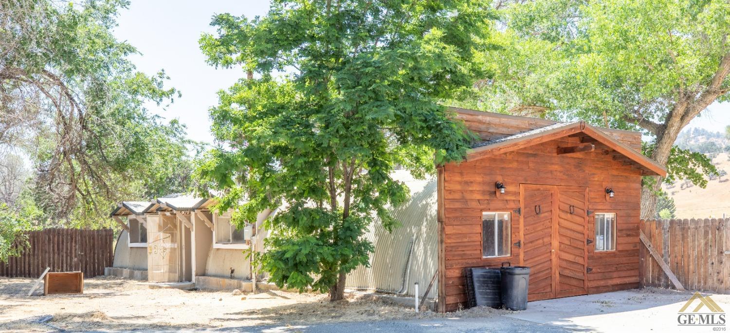 Undisclosed Address Caliente, CA 93518 - Photo 51 of 59 a front view of a house with trees