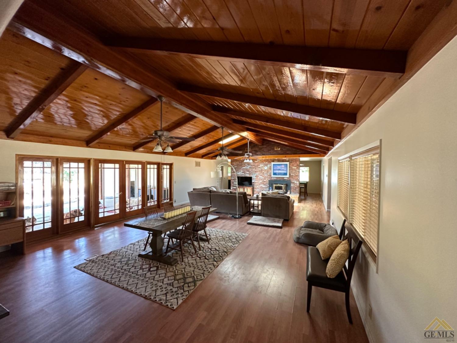 Undisclosed Address Caliente, CA 93518 - Photo 6 of 59 a living room with patio lots of furniture and a large window