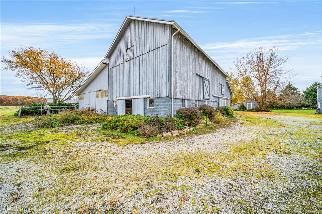 4804 Guest Road Jefferson, OH 44047 - Photo 29 of 48 View of property exterior featuring an outbuilding