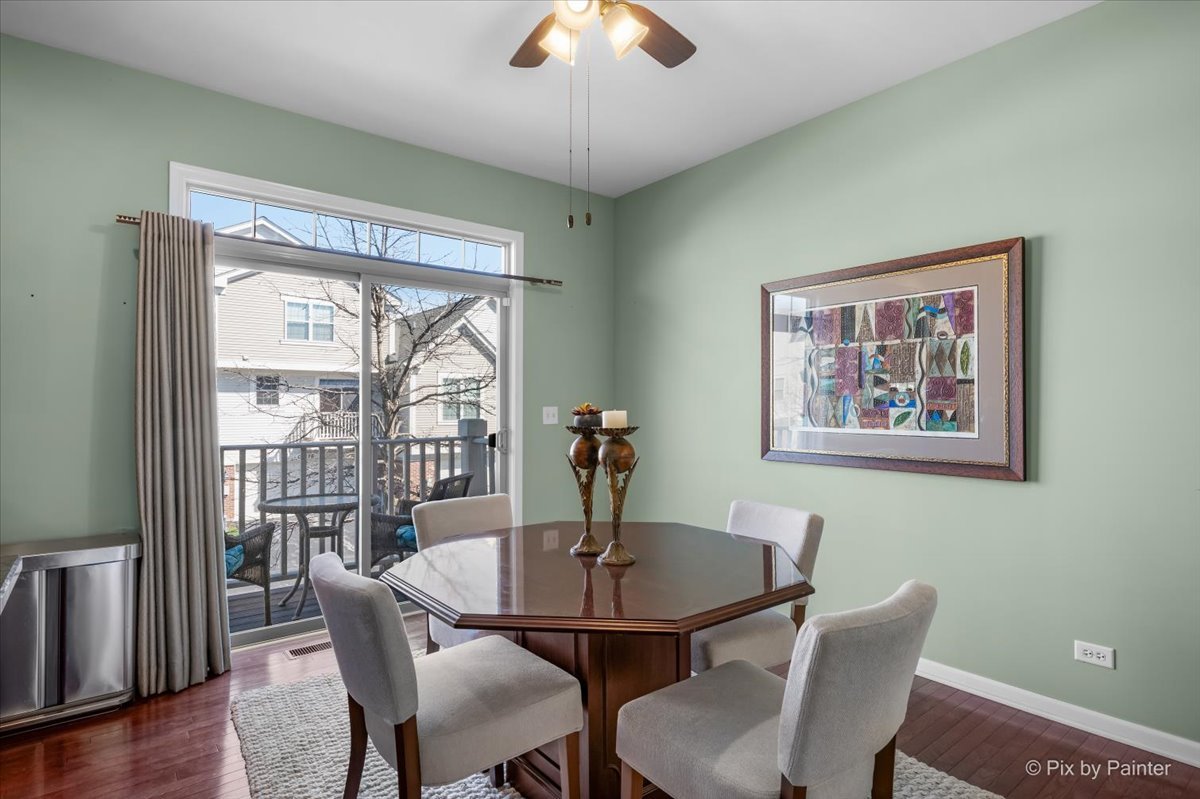 N079 Vermont Court Winfield, IL 60190 - Photo 12 of 33 a view of a dining room with furniture window and wooden floor