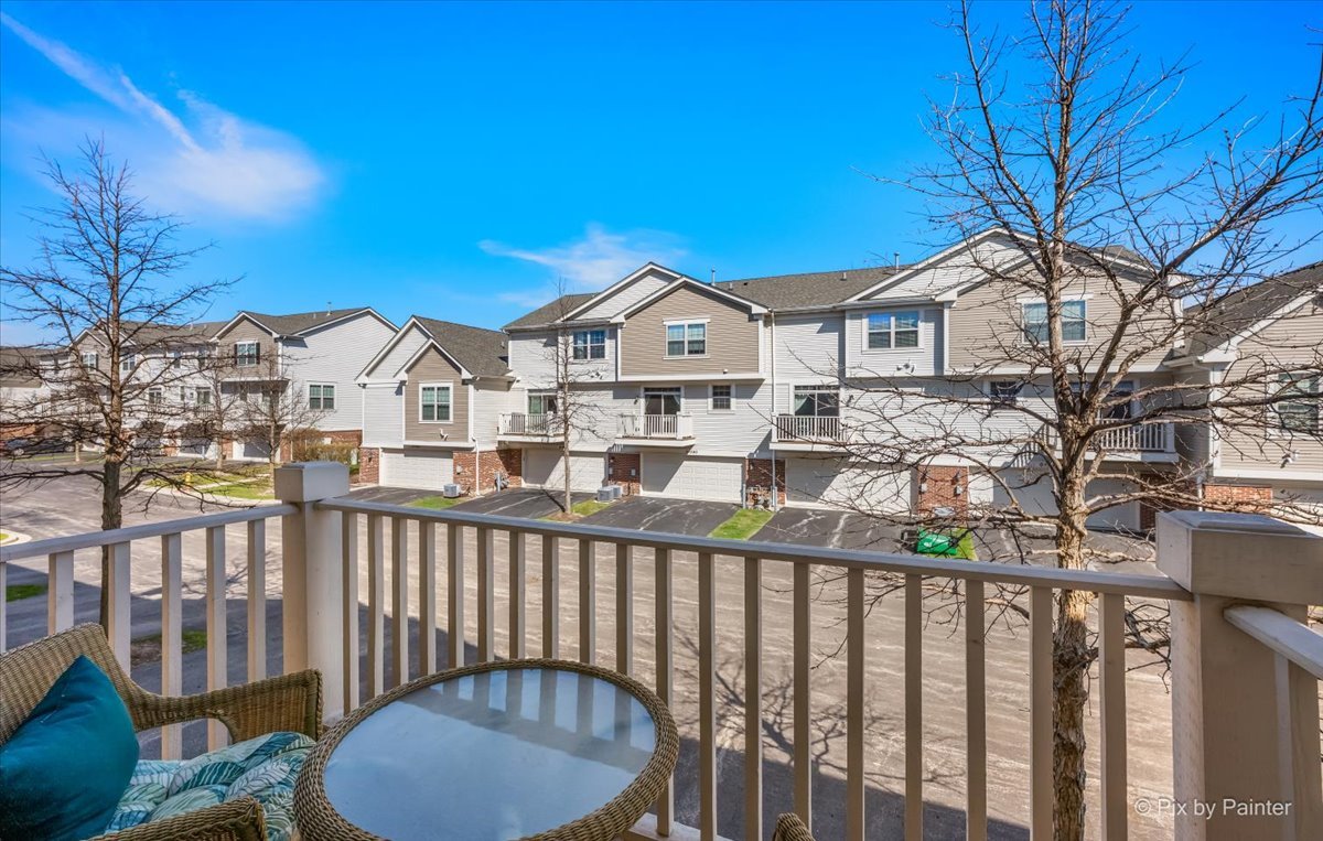 N079 Vermont Court Winfield, IL 60190 - Photo 13 of 33 a view of a city from a balcony