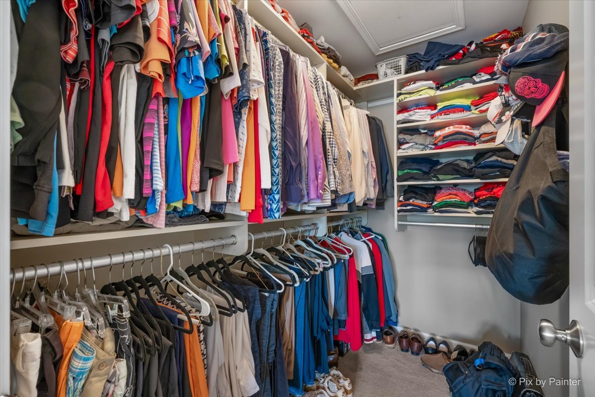 N079 Vermont Court Winfield, IL 60190 - Photo 19 of 33 a view of walk in closet with clothes