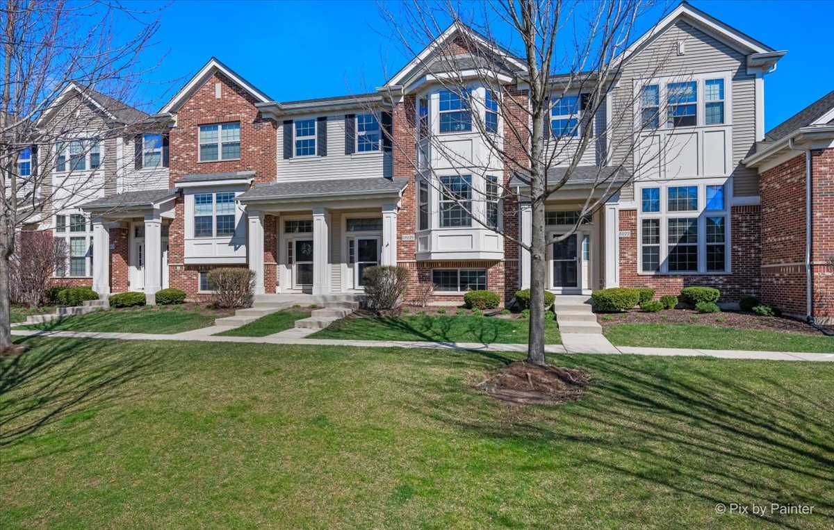 N079 Vermont Court Winfield, IL 60190 - Photo 2 of 33 a front view of a house with a yard