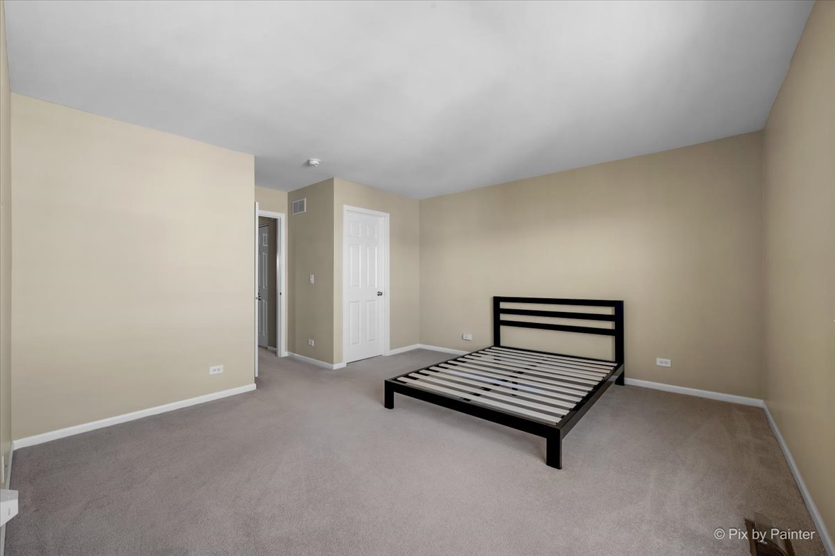 N079 Vermont Court Winfield, IL 60190 - Photo 22 of 33 a view of a room with stairs and a rug