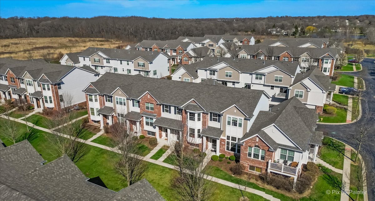 N079 Vermont Court Winfield, IL 60190 - Photo 26 of 33 an aerial view of residential houses with outdoor space and river