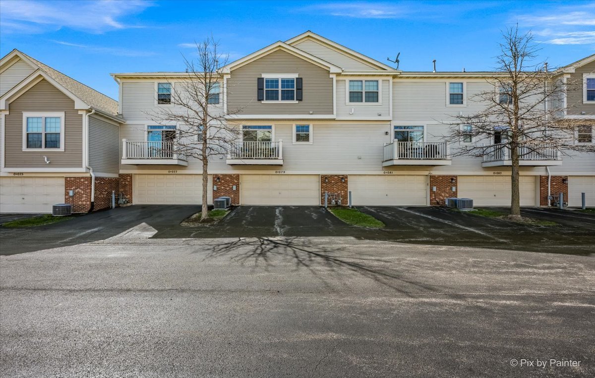N079 Vermont Court Winfield, IL 60190 - Photo 29 of 33 a front view of a house with a yard