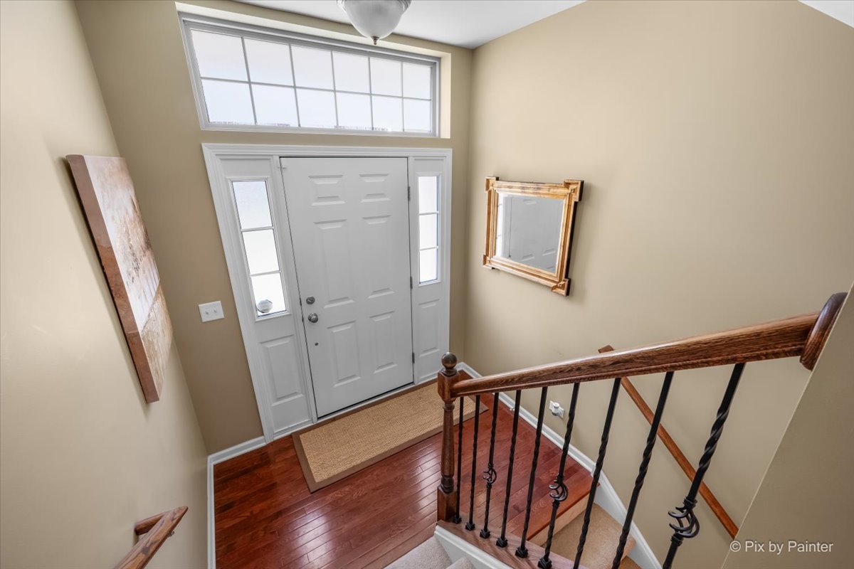 N079 Vermont Court Winfield, IL 60190 - Photo 3 of 33 a view of front door with wooden floor