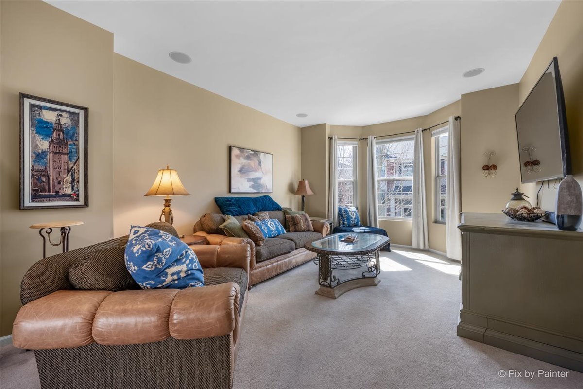 N079 Vermont Court Winfield, IL 60190 - Photo 4 of 33 a living room with furniture and a flat screen tv