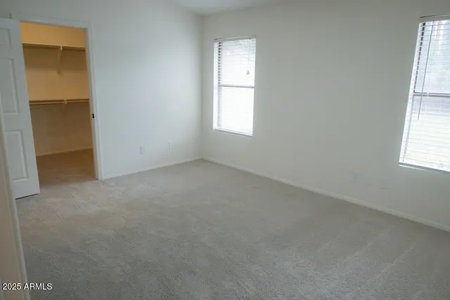 a view of a swimming pool with an outdoor space and seating area