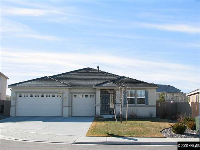 2372 Copper Springs Drive Reno, NV 89521 - Photo 1 of 9 a front view of a house with a yard