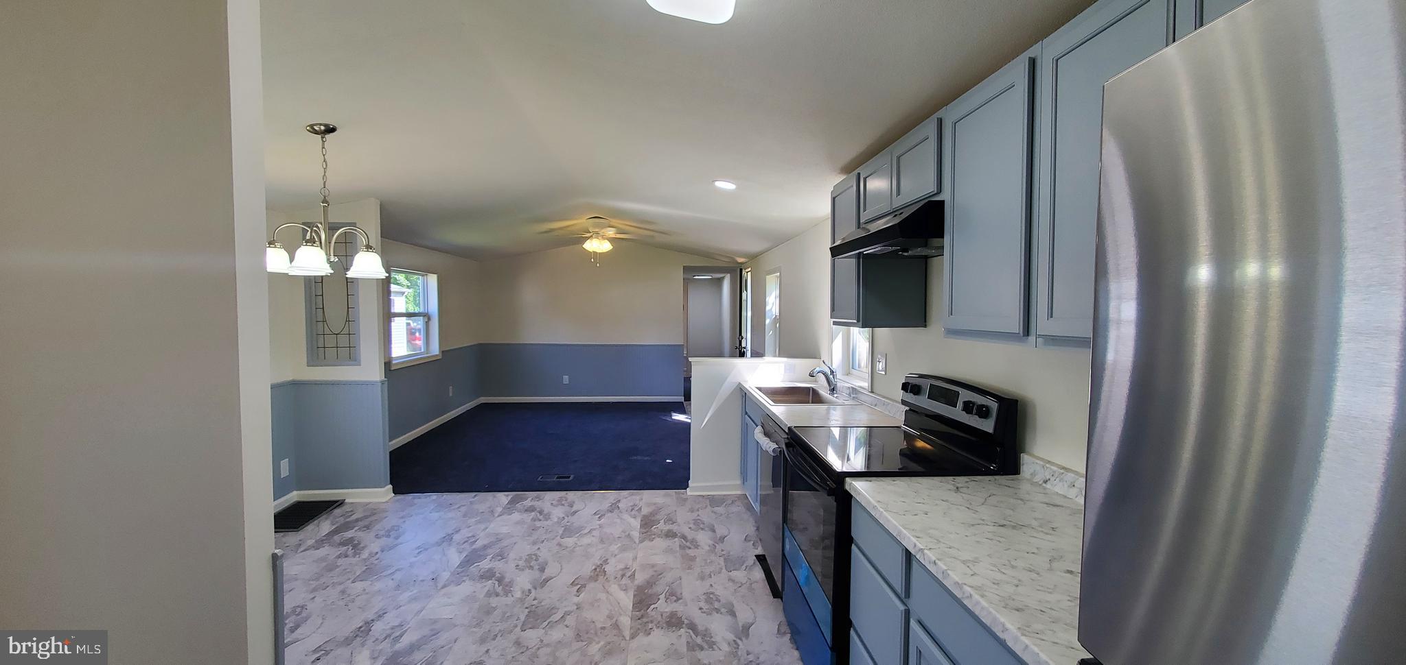 24 Curtis Drive Rising Sun, MD 21911 - Photo 1 of 17 Kitchen and living room view. All NEW!!!
