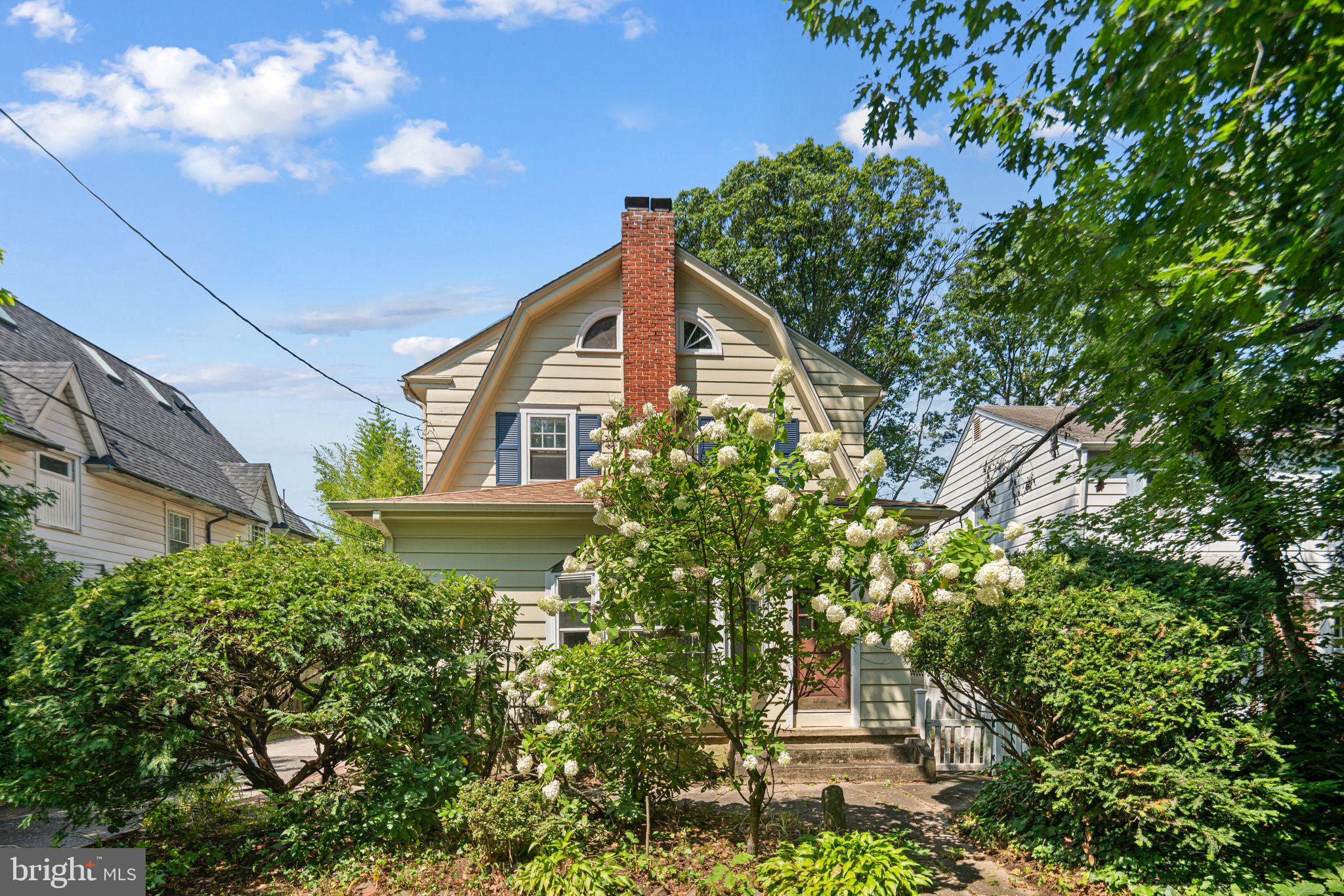404 Grove Street Haddonfield, NJ 08033 - Photo 1 of 30 a front view of a house with a yard