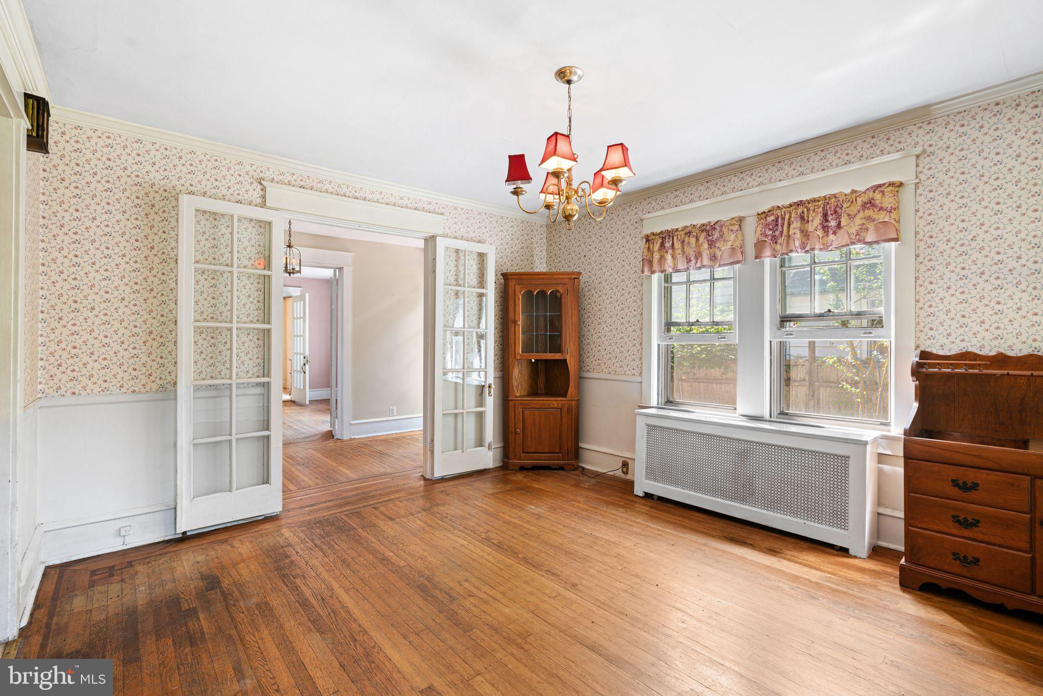 404 Grove Street Haddonfield, NJ 08033 - Photo 11 of 30 wooden floor in an empty room with a window