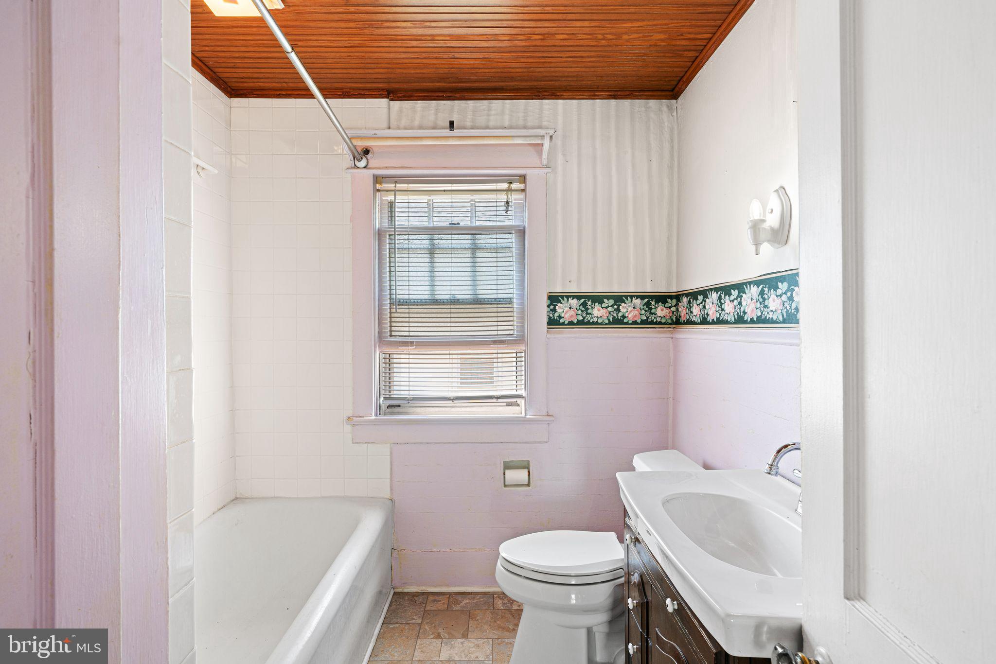 404 Grove Street Haddonfield, NJ 08033 - Photo 18 of 30 a bathroom with a sink toilet and shower