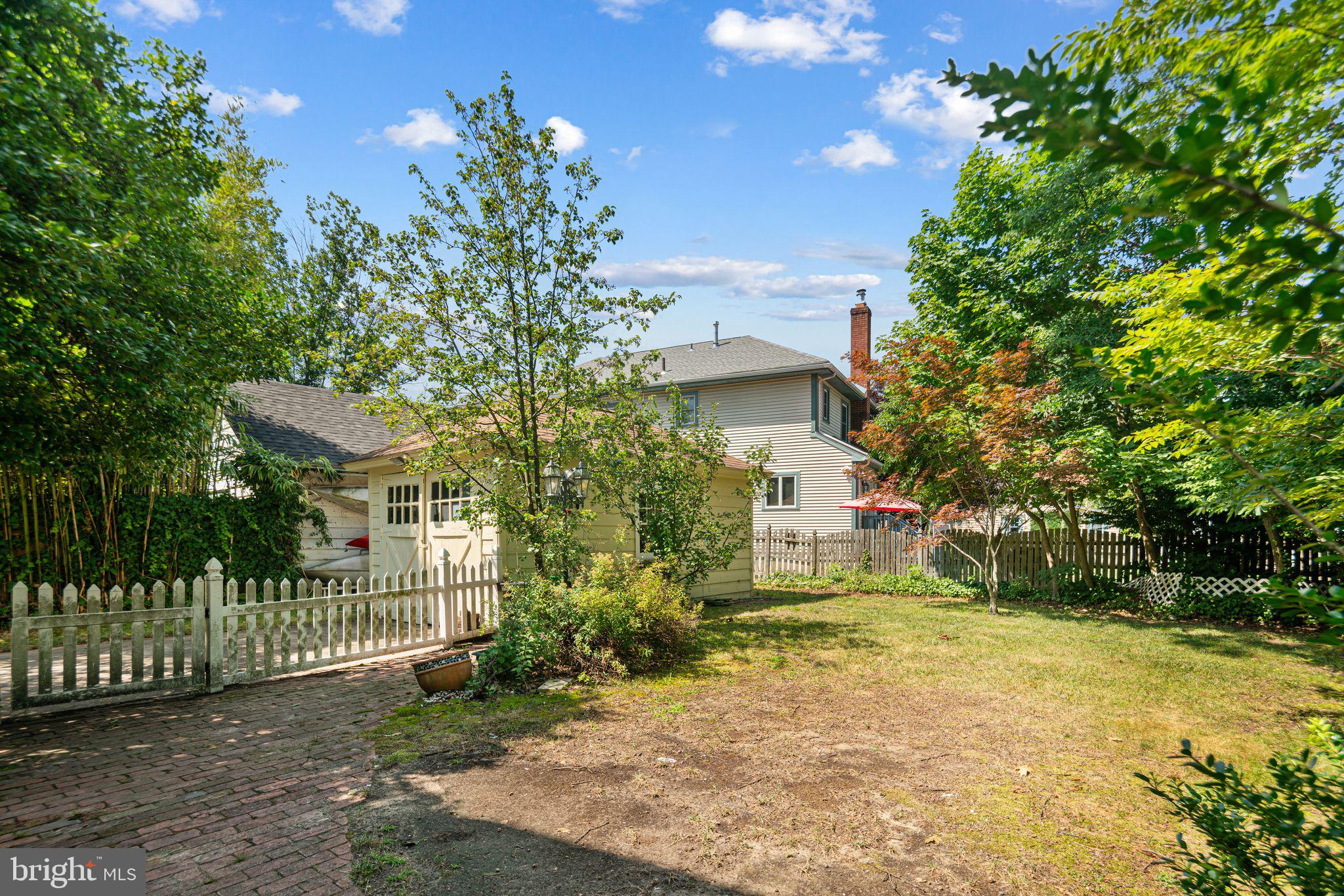 404 Grove Street Haddonfield, NJ 08033 - Photo 26 of 30 a front view of a house having yard