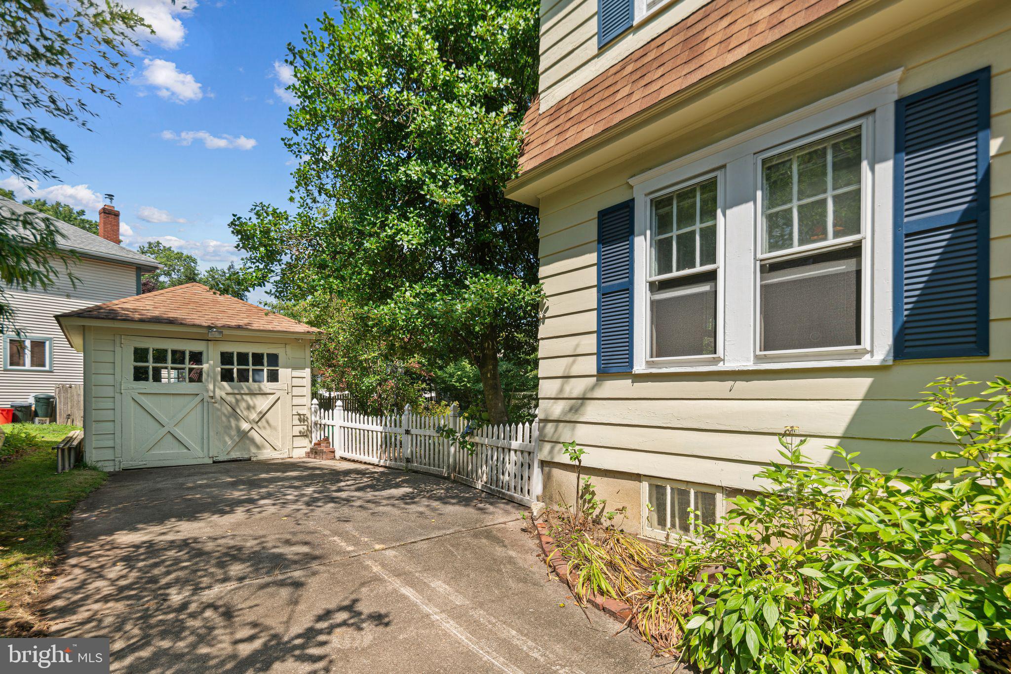 404 Grove Street Haddonfield, NJ 08033 - Photo 28 of 30 a small house with a trees in the background