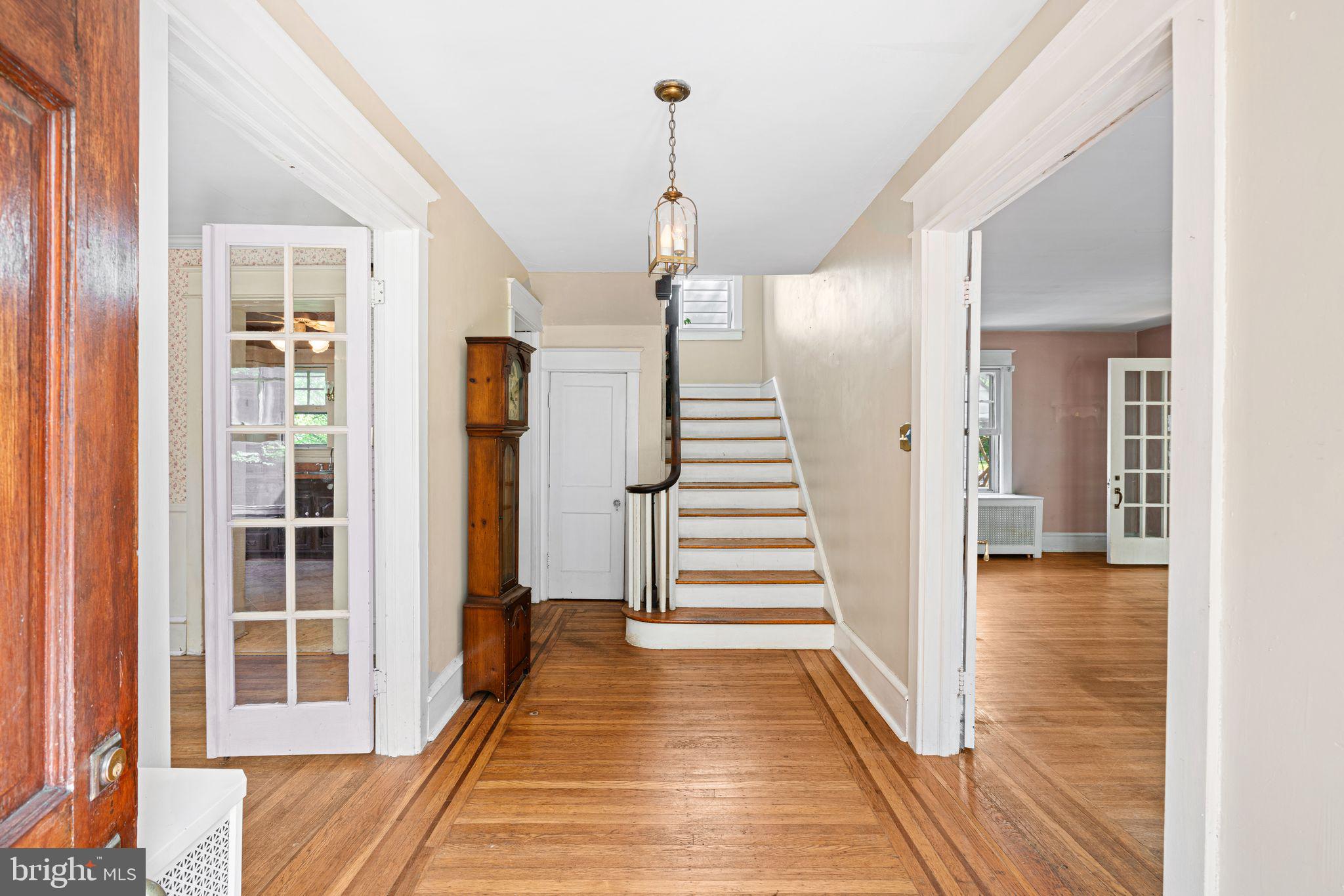404 Grove Street Haddonfield, NJ 08033 - Photo 4 of 30 a view of a hallway with wooden floor and staircase