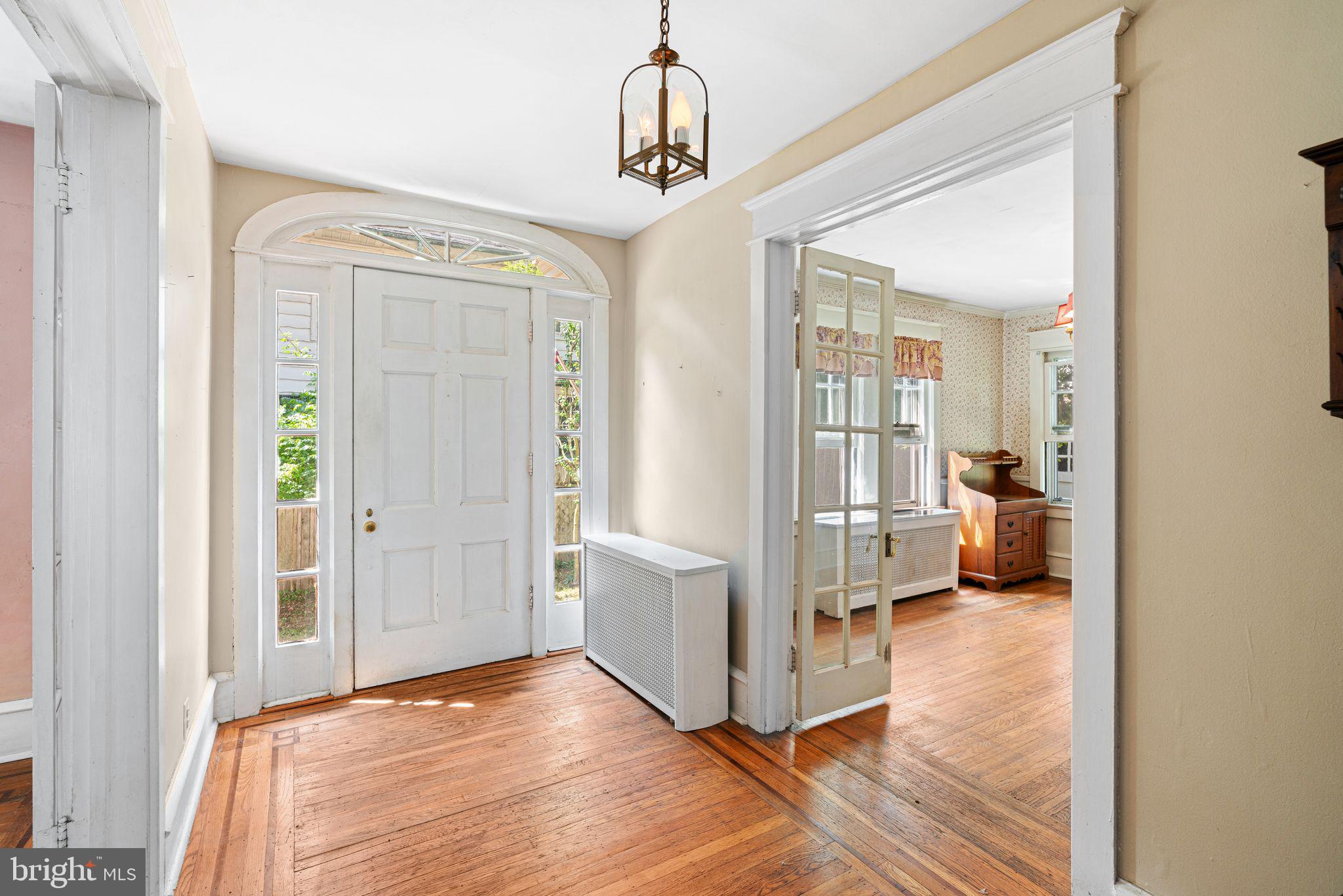 404 Grove Street Haddonfield, NJ 08033 - Photo 5 of 30 a view of a room with wooden floor and windows