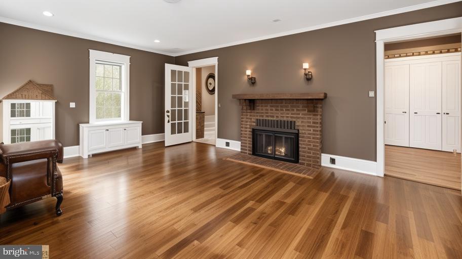 404 Grove Street Haddonfield, NJ 08033 - Photo 6 of 30 a view of a livingroom with wooden floor and a fireplace