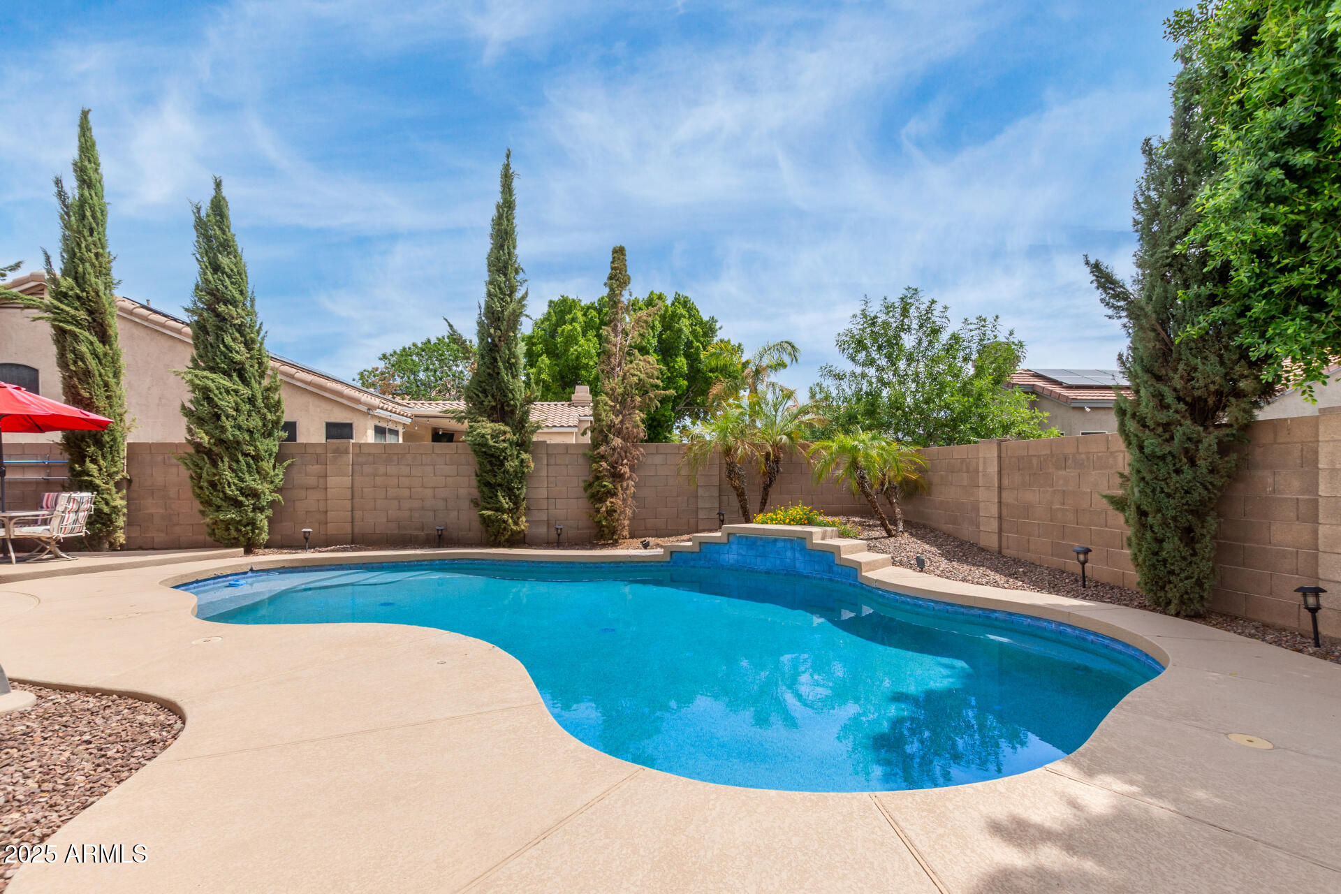 2859 East Millbrae Lane Gilbert, AZ 85234 - Photo 39 of 42 a view of outdoor space yard and swimming pool