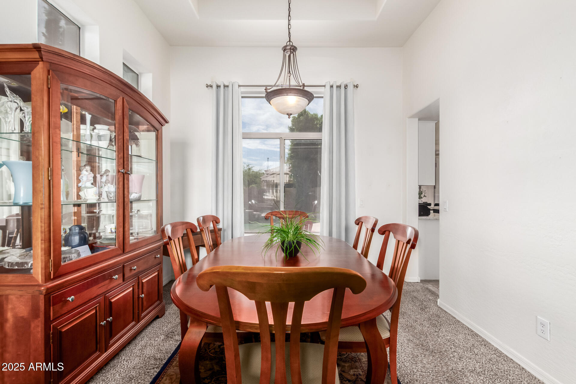 2859 East Millbrae Lane Gilbert, AZ 85234 - Photo 9 of 42 a view of a dining room with furniture window and outside view