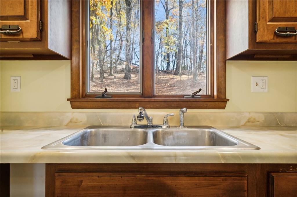6149 Baker School Road Trafford, PA 15085 - Photo 11 of 30 a kitchen sink with a granite countertop window and sink