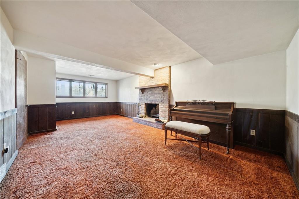 6149 Baker School Road Trafford, PA 15085 - Photo 19 of 30 a living room with furniture and a piano