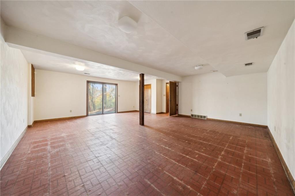 6149 Baker School Road Trafford, PA 15085 - Photo 22 of 30 a view of an empty room with windows