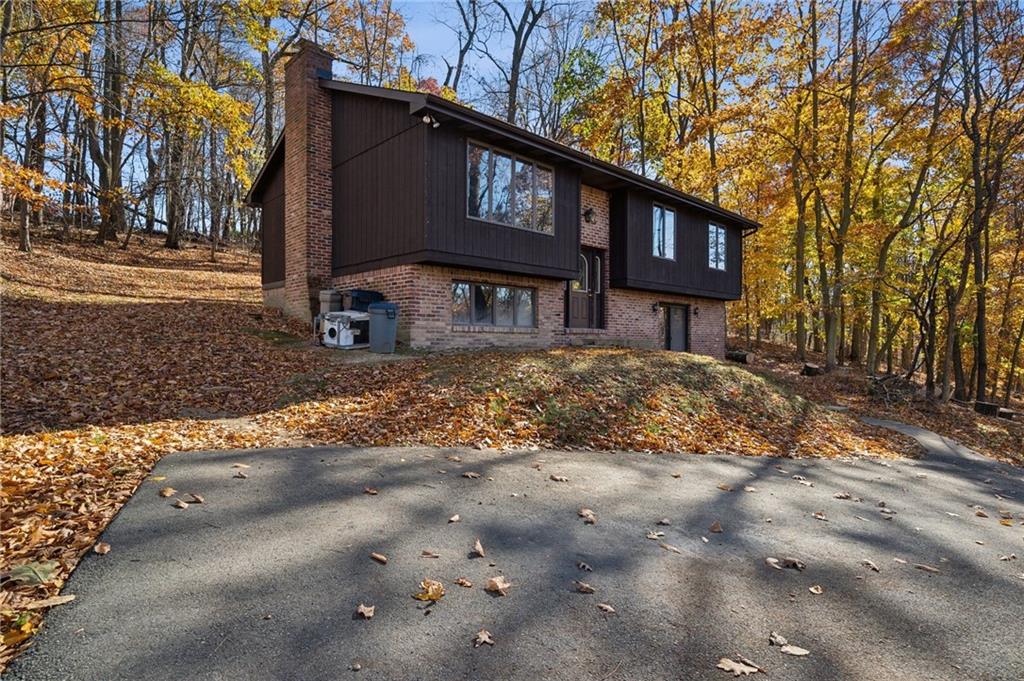 6149 Baker School Road Trafford, PA 15085 - Photo 3 of 30 a view of a house with a yard