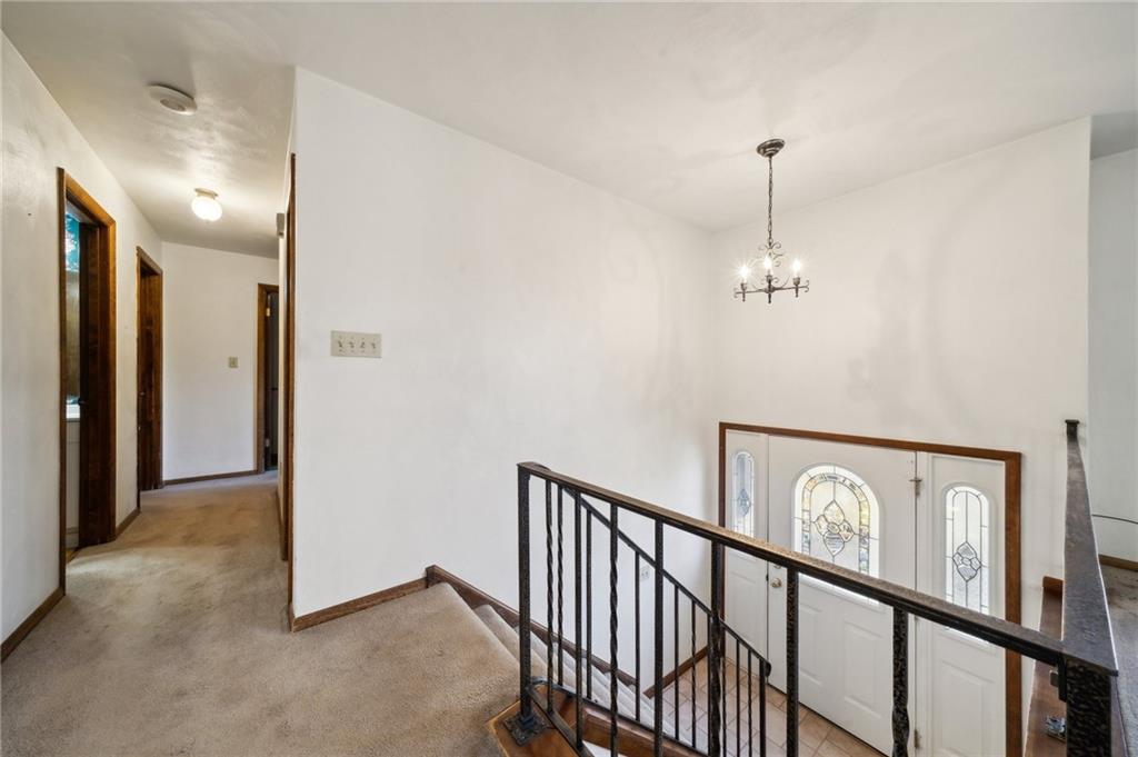 6149 Baker School Road Trafford, PA 15085 - Photo 4 of 30 a view of a hallway with a hallway
