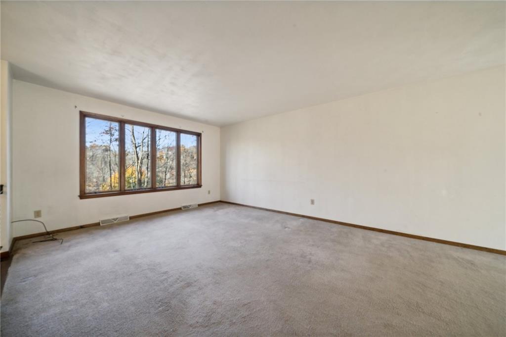 6149 Baker School Road Trafford, PA 15085 - Photo 5 of 30 an empty room with windows