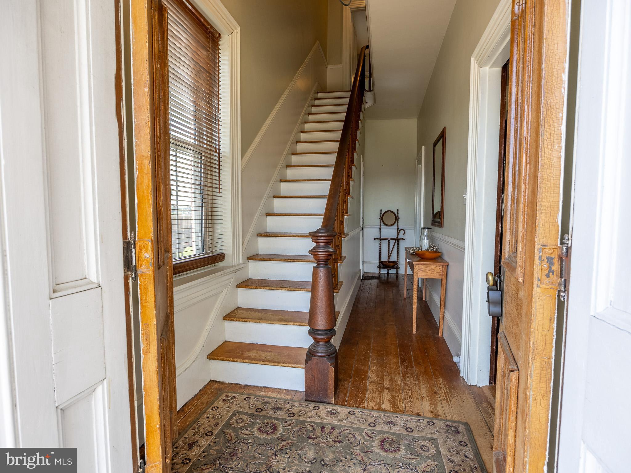 225 Niantic Road Barto, PA 19504 - Photo 46 of 82 a view of a hallway with wooden floor and staircase