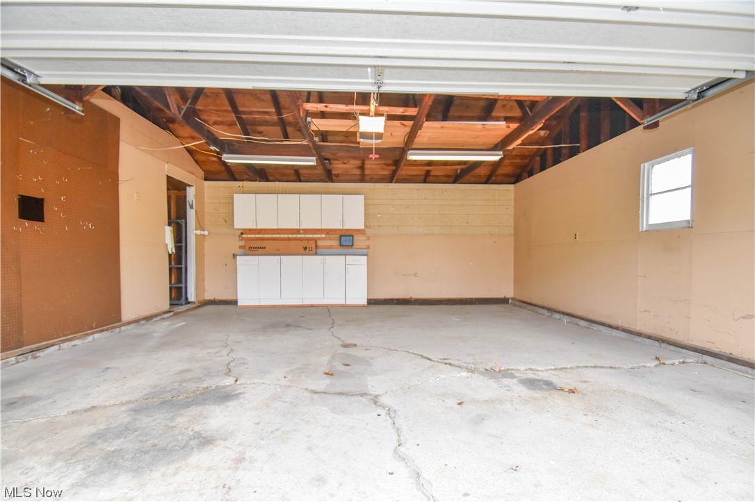 4606 Burkey Road Youngstown, OH 44515 - Photo 40 of 49 Garage with a garage door opener