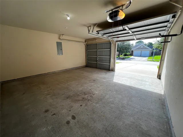 a view of an empty room and glass door