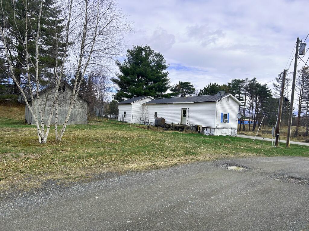 Lot 19 Old Farm Road Medway, ME 04460 - Photo 5 of 9 Photo 5 - Back of Trailer by Road (Copy)