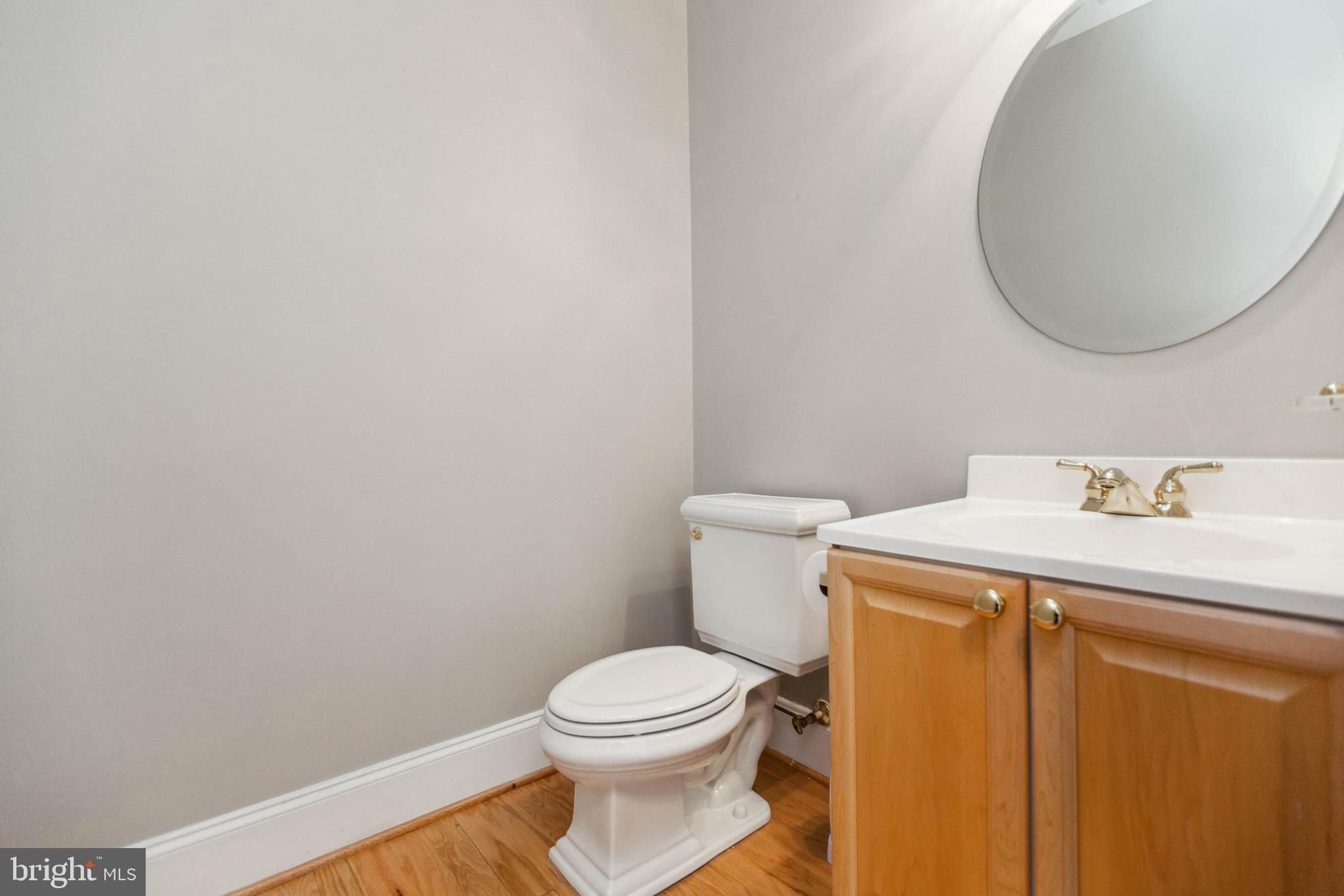 2500 Waterside Drive, Unit 405 Frederick, MD 21701 - Photo 12 of 45 Half bath for guests off of the living room.