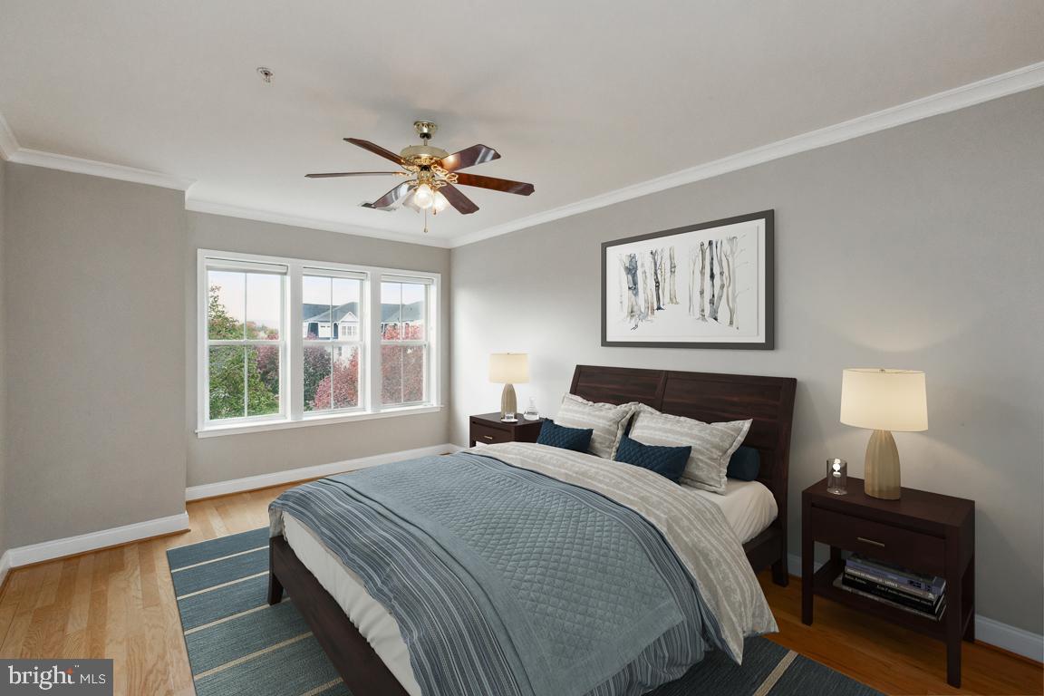 2500 Waterside Drive, Unit 405 Frederick, MD 21701 - Photo 29 of 45 Virtually staged primary bedroom