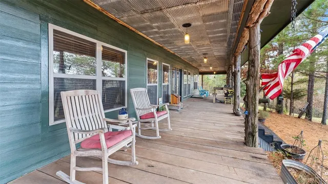 a view of a backyard of the house