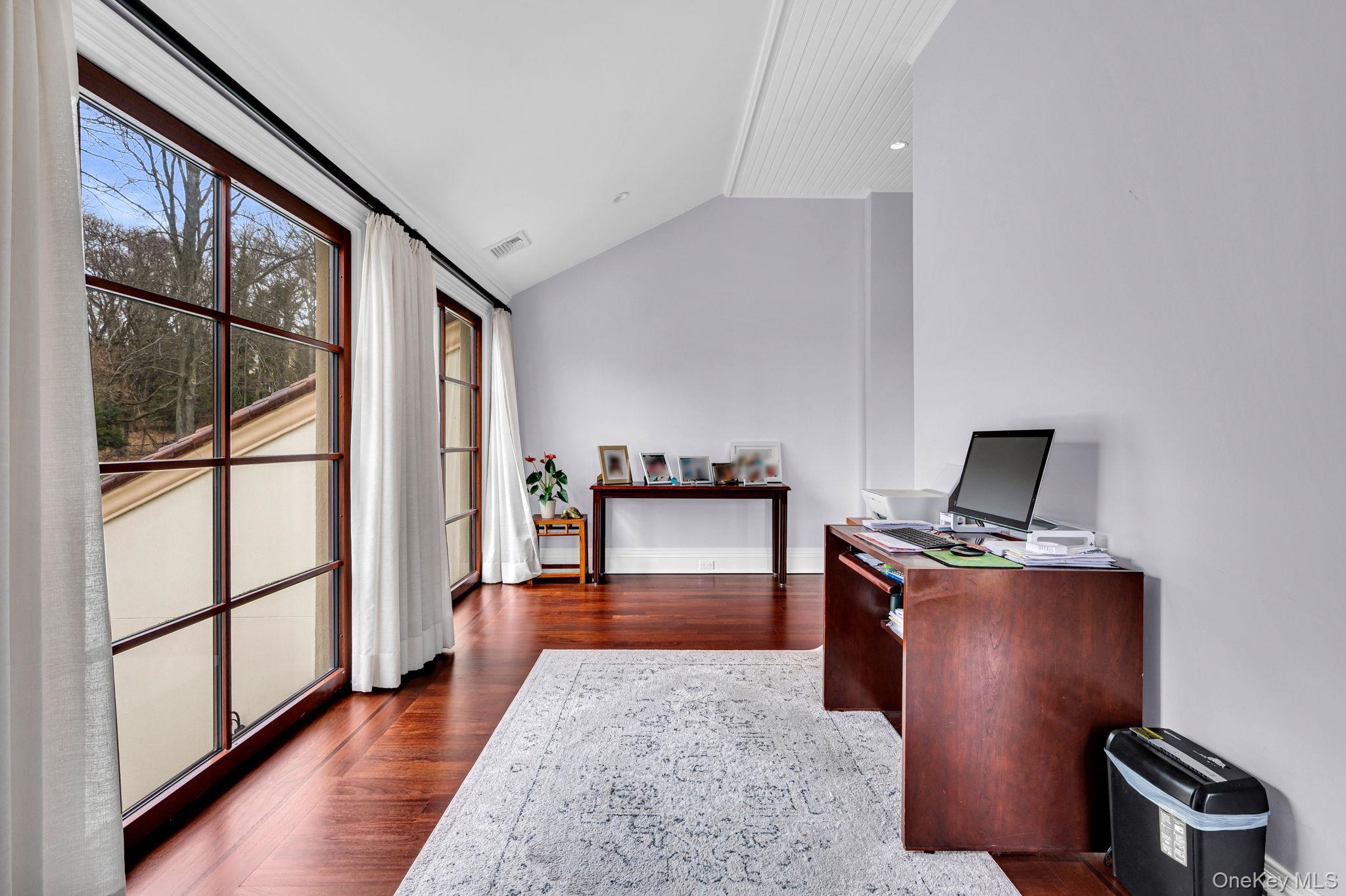 717 Short Beach Road St. James, NY 11780 - Photo 21 of 47 a living room with furniture and a window
