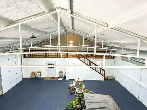 a view of a balcony with a potted plant