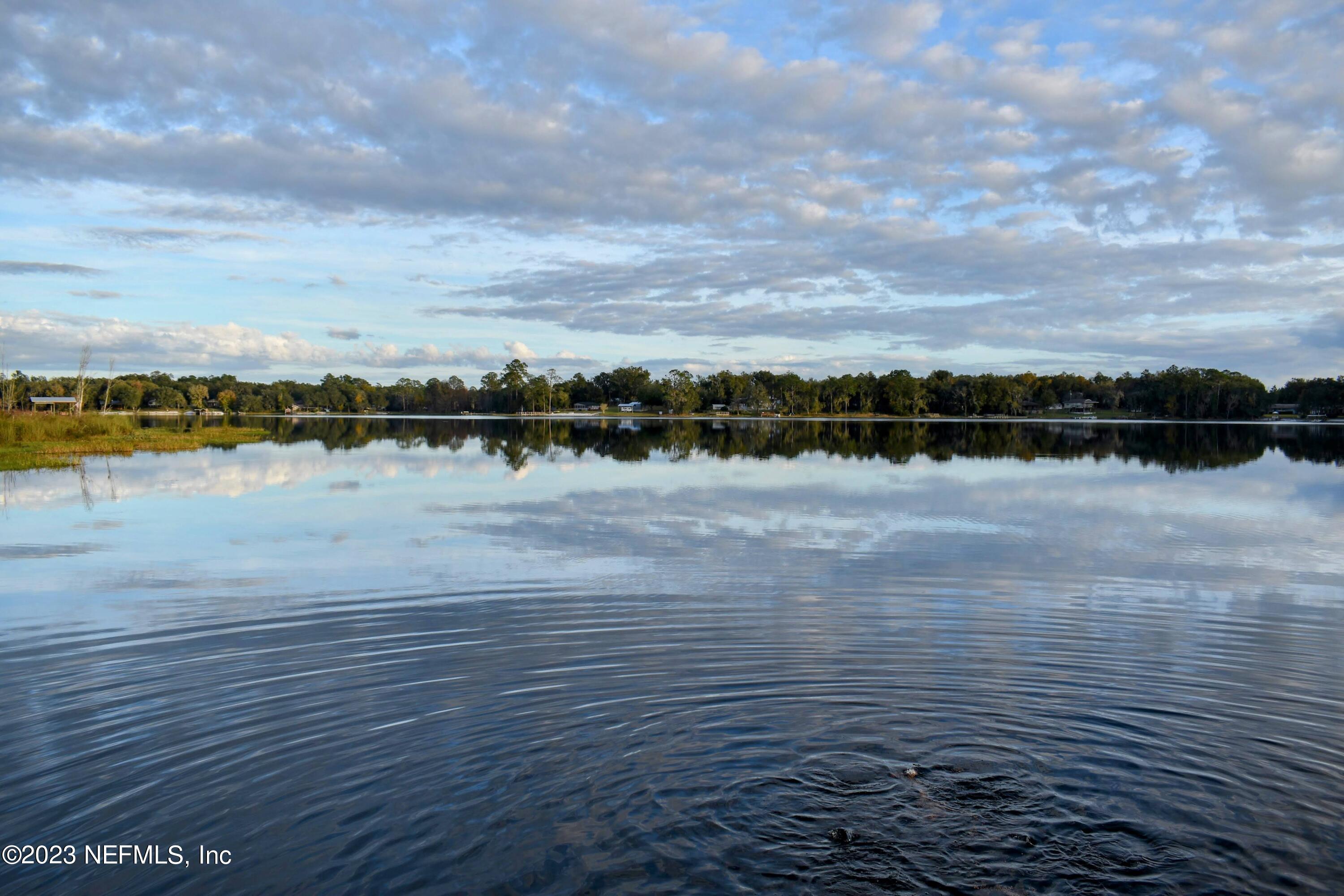 0 Simpson Drive Interlachen, FL 32148 - Photo 5 of 34 a view of a lake view with houses in back