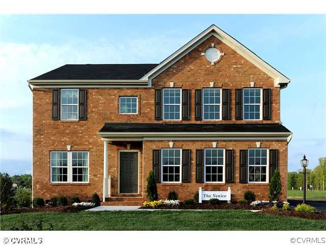 10118 Orchard Meadow Road Mechanicsville, VA 23116 - Photo 1 of 7 front view of a house with a yard