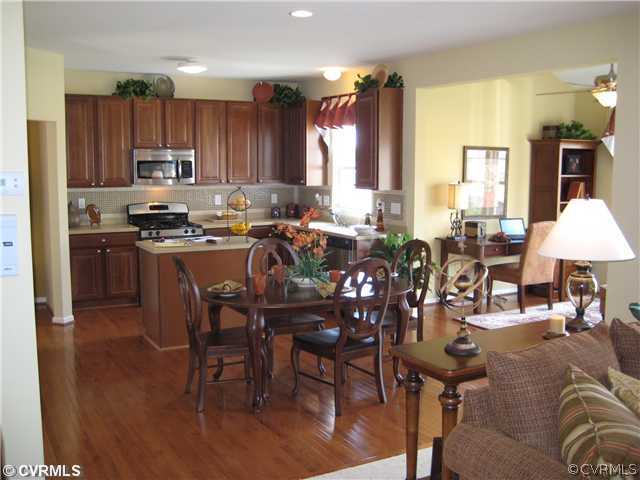 10118 Orchard Meadow Road Mechanicsville, VA 23116 - Photo 3 of 7 a view of a dining room with furniture