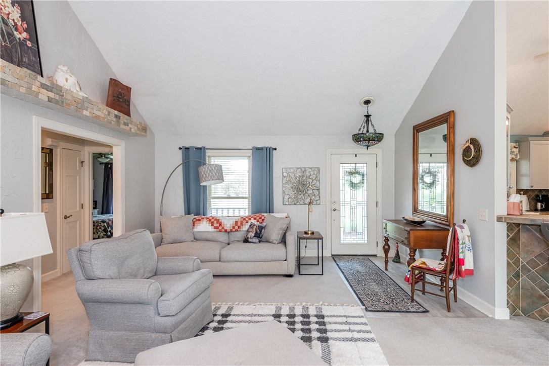 159 East Lytle 5 Points Road Springboro, OH 45066 - Photo 6 of 45 This inviting living area features vaulted ceilings and ample natural light, perfect for comfortable living.