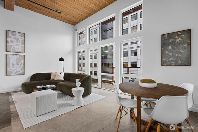 a living room with furniture and a table