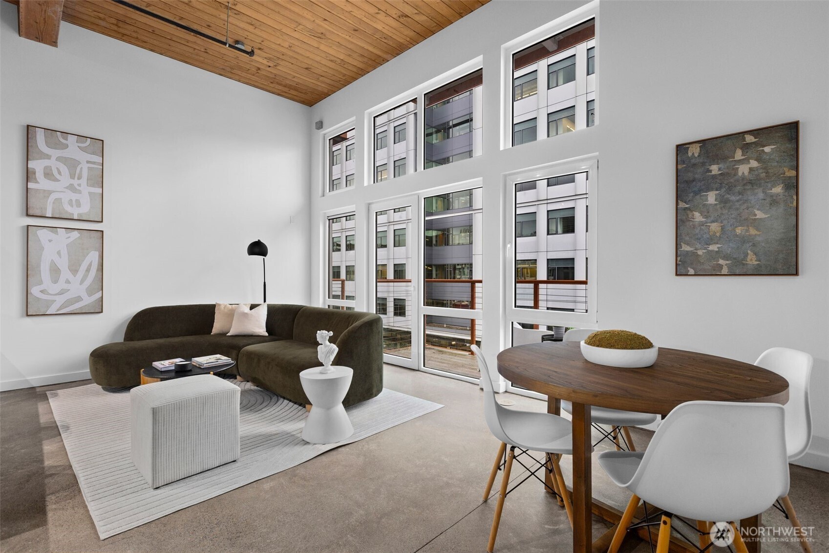 a living room with furniture and a table