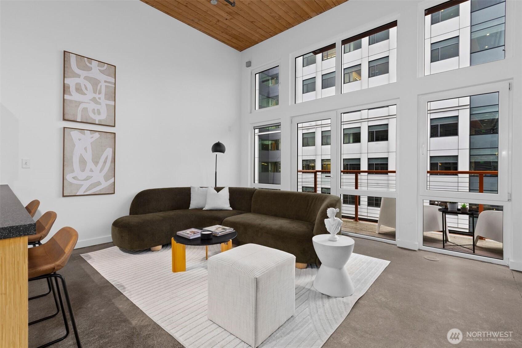 401 9th Avenue North, Unit 504 Seattle, WA 98109 - Photo 17 of 38 a living room with furniture and a window