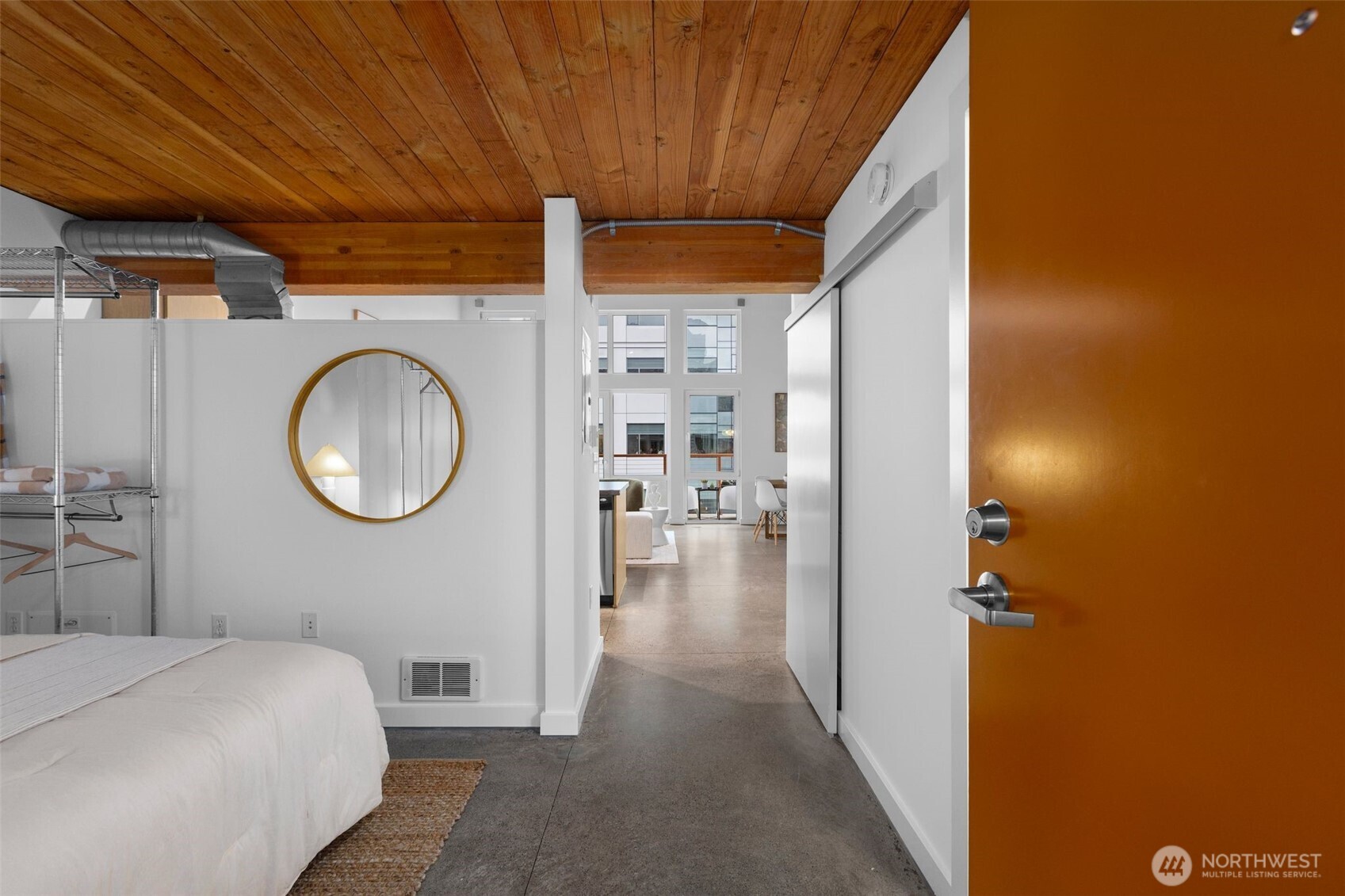 401 9th Avenue North, Unit 504 Seattle, WA 98109 - Photo 4 of 38 a bedroom with a bed and a view of bathroom