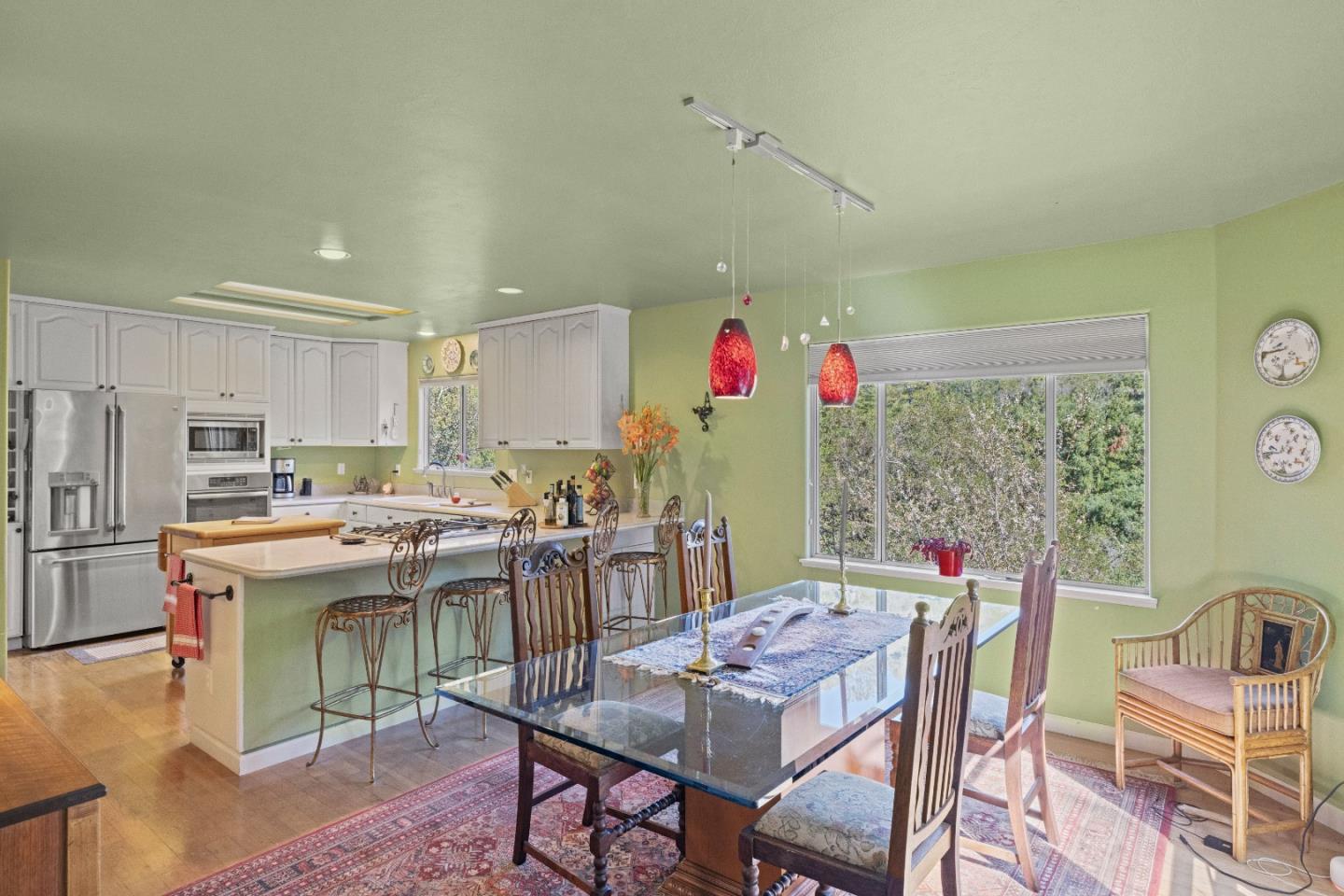 38621 Palo Colorado Road Carmel, CA 93923 - Photo 13 of 32 a view of a dining room with furniture window and outside view
